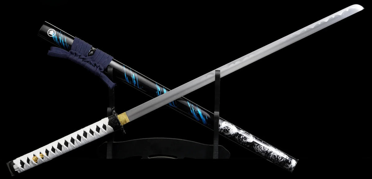 Ghost of Tsushima Jin Sakai display katana, drawn, crossed over its black and blue scabbard